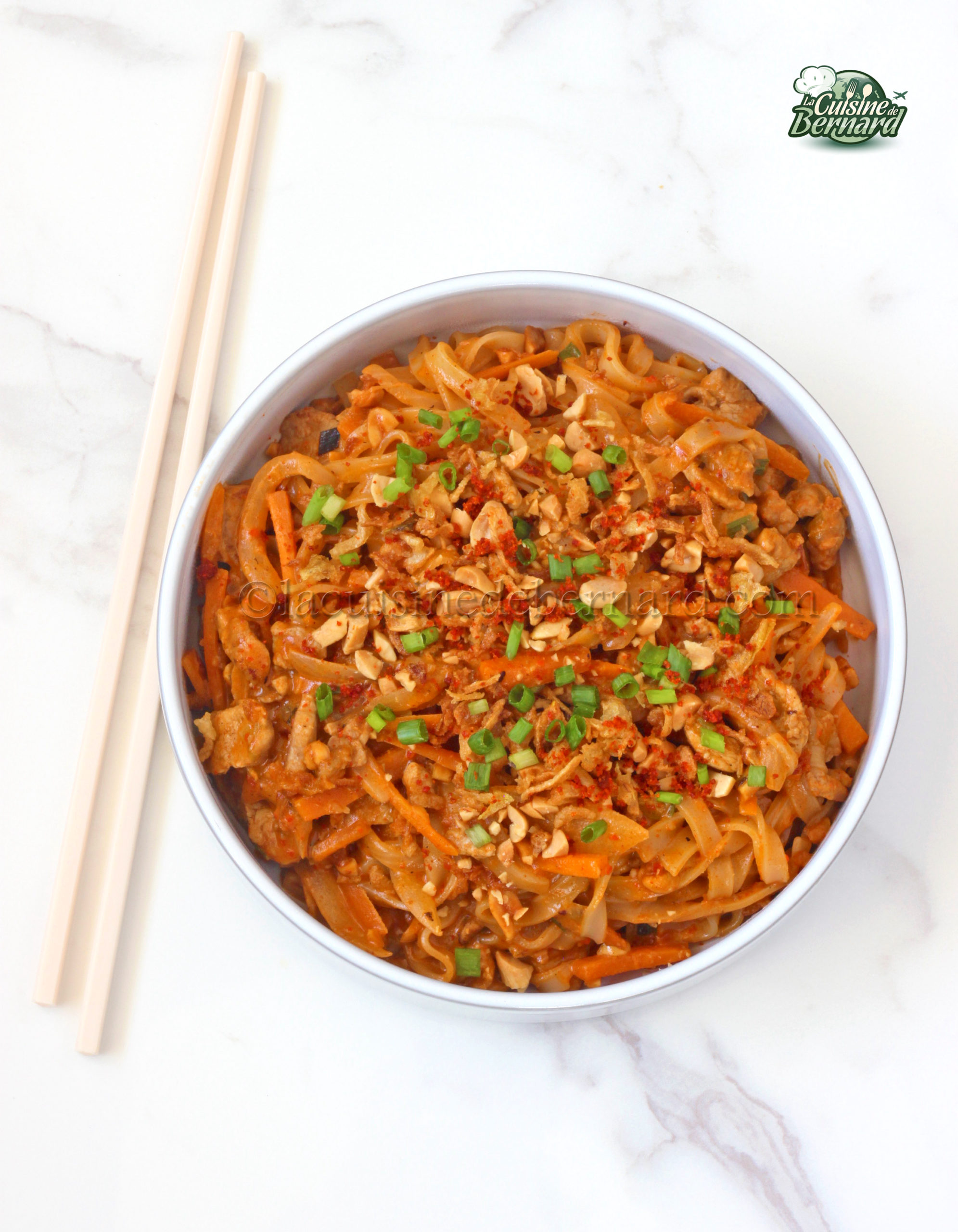 Sautéed pork, satay and coconut milk pasta